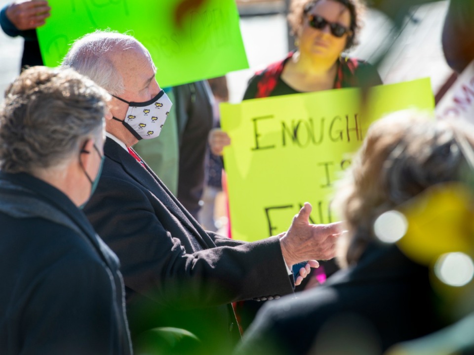 <strong>Collierville Mayor Stan Joyner talks with a group of business owners and citizens protesting Shelby County Health Department COVID-19 mandates.</strong> (Greg Campbell/Special to the Daily Memphian)