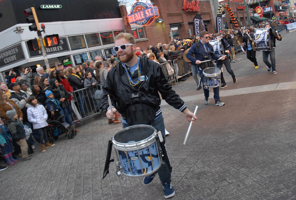 <strong>The Grizzline &ndash; the official drumline of the Memphis Grizzlies &ndash; performs for paradegoers.</strong> (Stan Carroll/Special to The Daily Memphian)