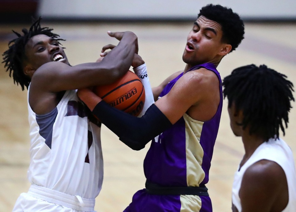 <strong>Christian Brothers High School guard Reese Mcmullen (right) fights for a loose ball during a game against Collierville High School on Tuesday, Dec. 22.</strong> (Patrick Lantrip/Daily Memphian)