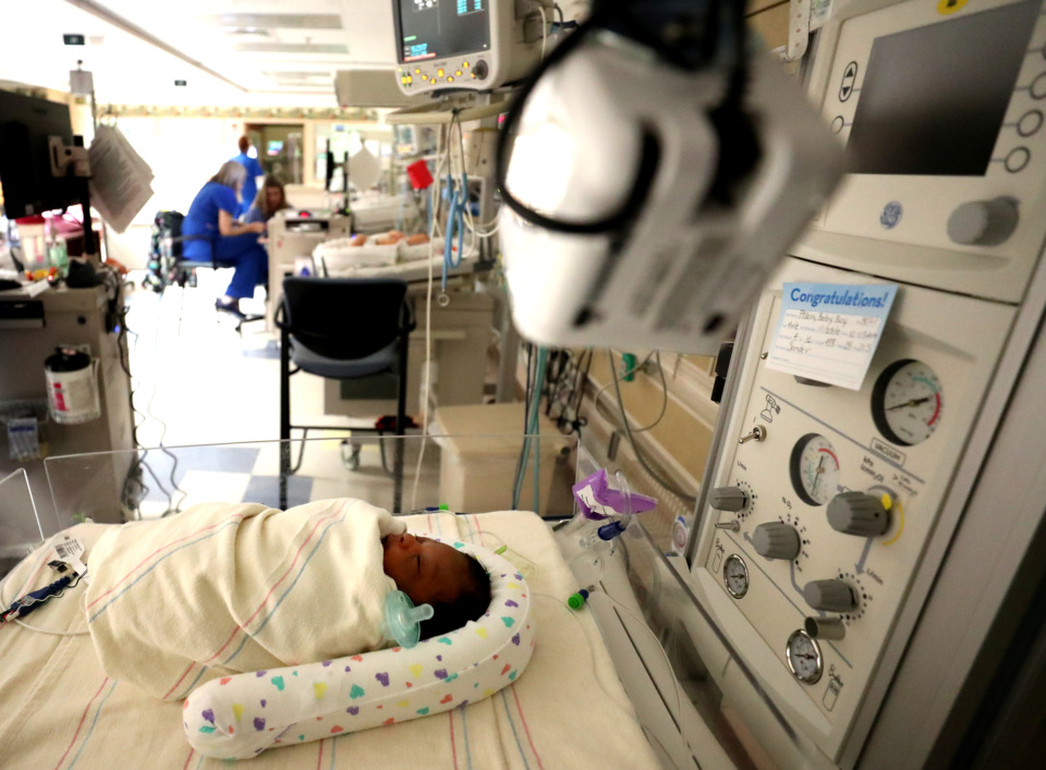 <strong>Tristen Pillow rests in the neonatal intensive care unit (NICU) at Baptist Memorial Hospital for Women after recovering from surgery. Tristen is being observed by a NICView camera that provides a live-streamed view to the parents and loved ones who cannot be there.</strong> (Houston Cofield/Daily Memphian)