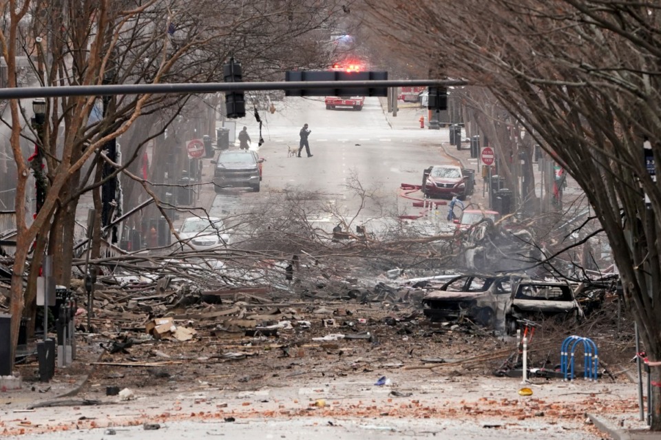 <strong>Emergency personnel work near the scene of an explosion in downtown Nashville, Friday, Dec. 25, 2020. Buildings shook in the immediate area and beyond after a loud boom was heard early Christmas morning.</strong> (Mark Humphrey/AP)