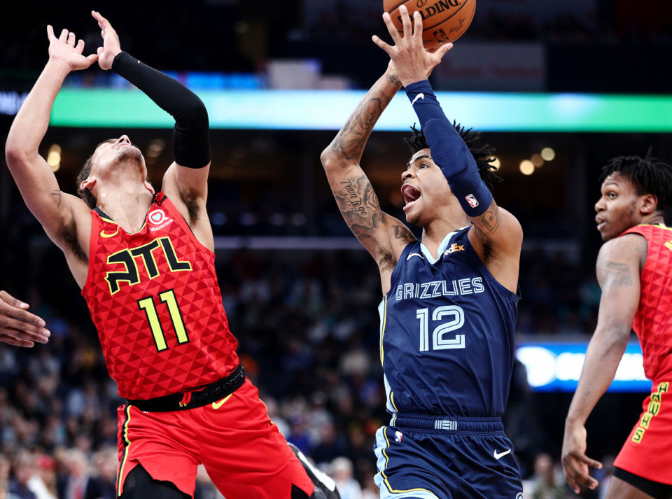 <strong>Memphis Grizzlies guard Ja Morant (12) and Atlanta Hawks guard Trae Young (11) meet again Saturday, Dec. 26 at the FedExForum.</strong> (Patrick Lantrip/Daily Memphian file)