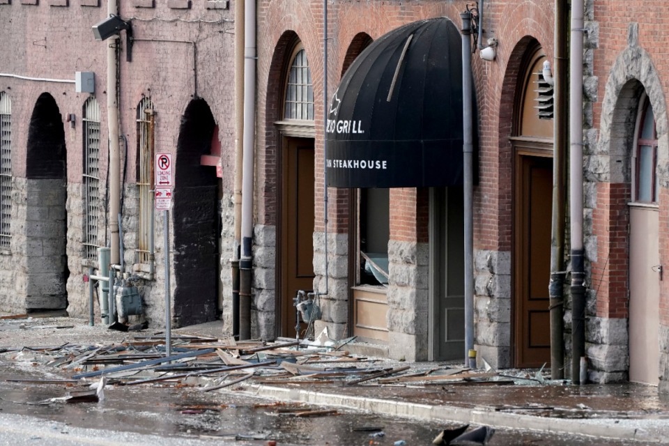 <strong>Debris is scattered near the scene of an explosion in downtown Nashville,&nbsp; Friday, Dec. 25, 2020. Buildings shook in the immediate area and beyond after a loud boom was heard early Christmas morning.</strong> (Mark Humphrey/AP)