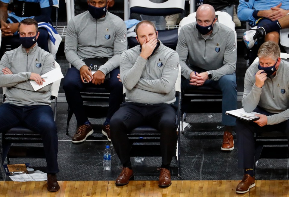 <strong>Memphis Grizzlies head coach Taylor Jenkins (middle) watch action against Atlanta Hawks from the bench on Saturday, Dec. 26, 2020.</strong> (Mark Weber/The Daily Memphian)