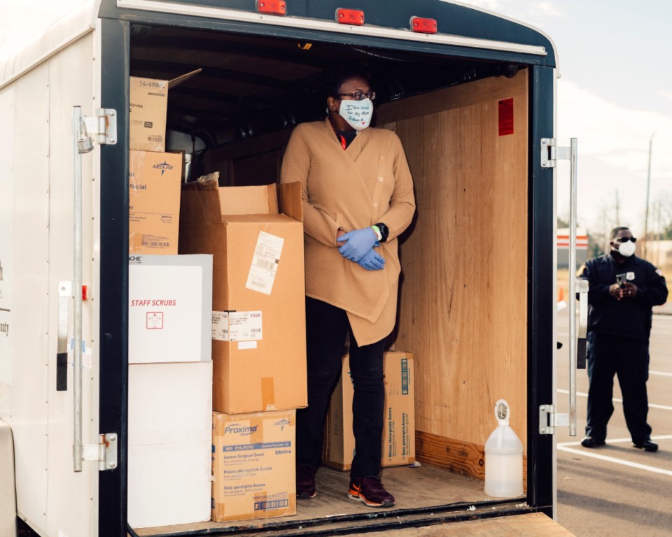 <strong>A health care worker stands in a trailer loaded with coronavirus vaccines on Monday, Dec. 28.</strong> (Houston Cofield/Special to the Daily Memphian)