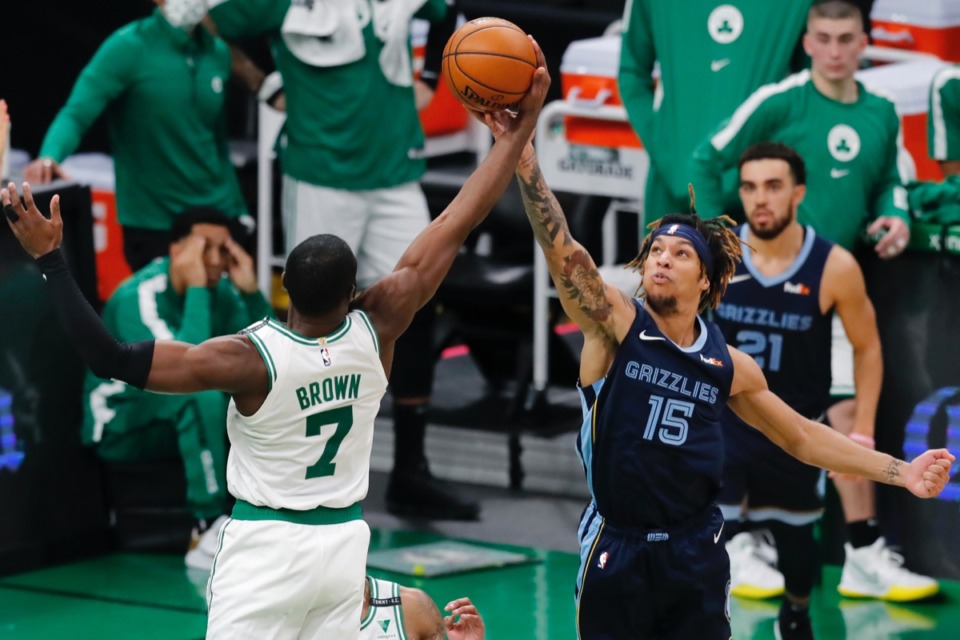 <strong>Brandon Clarke (15) and&nbsp;Boston Celtics' Jaylen Brown (7) battle for a rebound on Wednesday, Dec. 30, 2020, in Boston.</strong> (Michael Dwyer/AP)