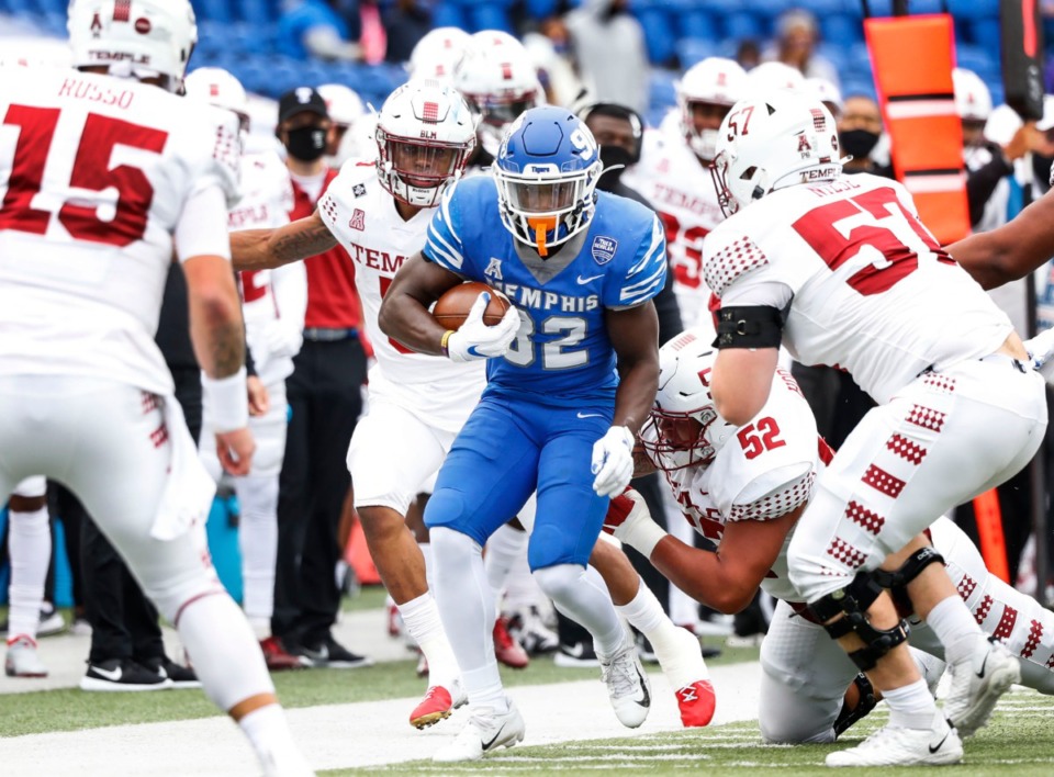 <strong>Memphis defender Jacobi Francis (middle) returns an interception against the Temple defense during action on Saturday, Oct. 24, 2020 at Liberty Bowl Memorial Stadium.</strong> (Mark Weber/The Daily Memphian)