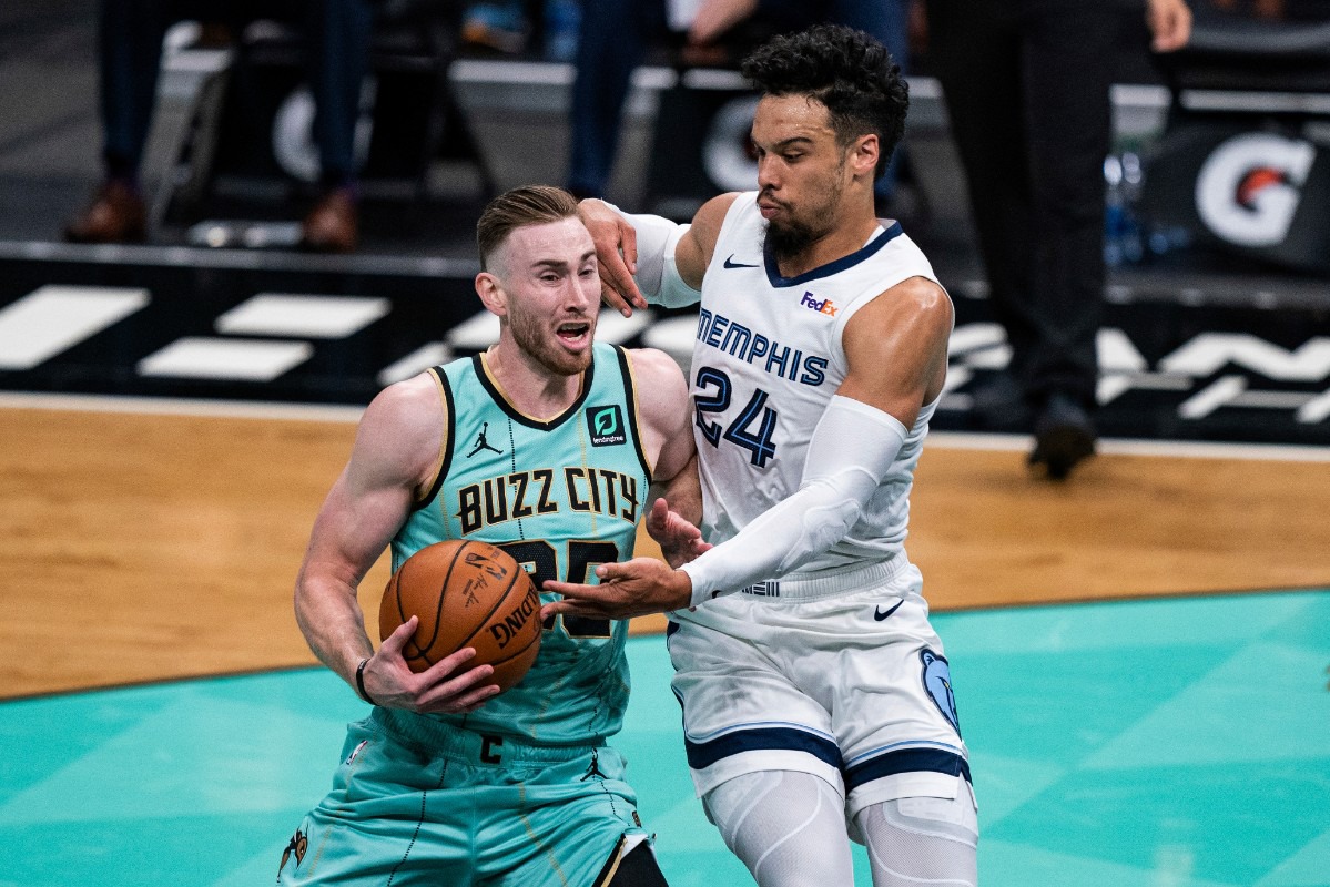 <strong>Memphis Grizzlies guard Dillon Brooks (24) defends against Charlotte Hornets forward Gordon Hayward (20) during the first half of an NBA basketball game in Charlotte, N.C., Friday, Jan. 1, 2021.</strong> (AP Photo/Jacob Kupferman)