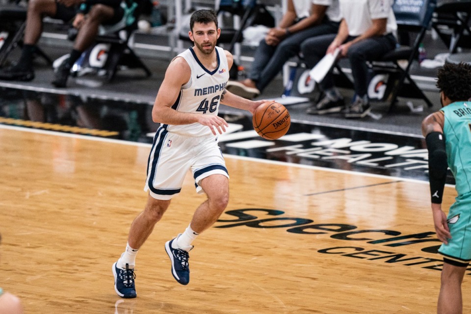 <strong>Memphis Grizzlies guard John Konchar (46) brings the ball up court against the Charlotte Hornets during an NBA basketball game in Charlotte, N.C., Friday, Jan. 1, 2021.</strong> (Jacob Kupferman/AP)