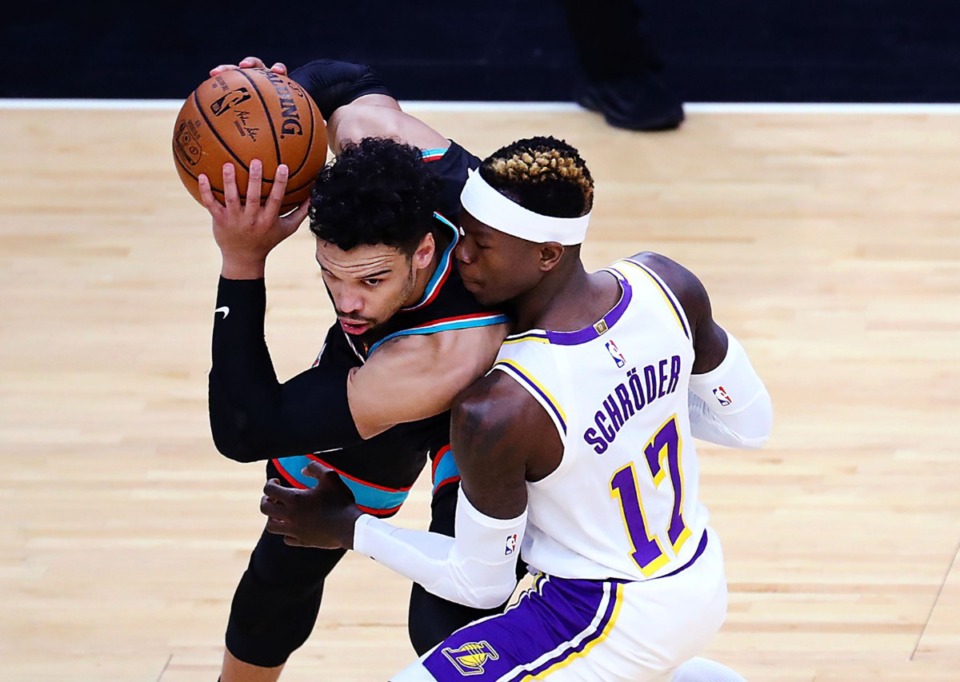 <strong>Memphis Grizzlies forward Dillon Brooks (24) tries to get past Los Angeles Lakers guard Dennis Schroder (17) during a Jan. 3, 2021 game at the FedExForum.</strong> (Patrick Lantrip/Daily Memphian)