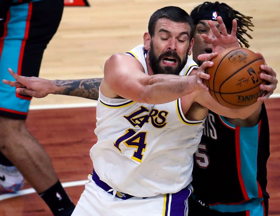 <strong>Memphis Grizzlies forward Brandon Clarke (15) fights for a rebound over Los Angeles Lakers center Marc Gasol (14) during a Jan. 3, 2021 game at the FedExForum.</strong> (Patrick Lantrip/Daily Memphian)