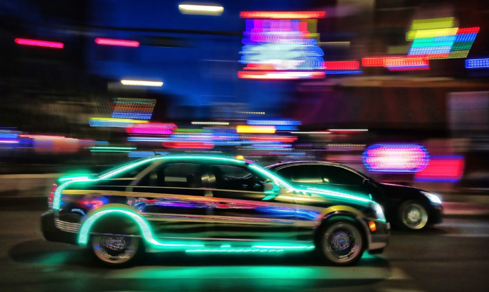 <strong>Muscle cars pass by the lights on Beale Street while cruising B.B. King Boulevard in Downtown Memphis on May 9, 2020. Memphis police are investigating a Jan. 2 drag racing incident on Interstate 240 near Walnut Grove.</strong>&nbsp;(Jim Weber/Daily Memphian file)