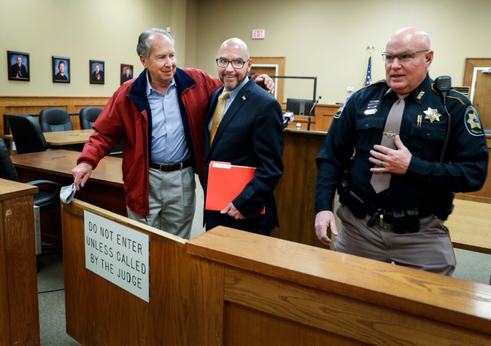 <strong>Former DeSoto County Justice Court Judge Ken Adams (middle) is greeted by his father Drennon Adams (left) after announcing his candidacy for Olive Branch Mayor on Monday, January 4, 2021.</strong> (Mark Weber/The Daily Memphian)