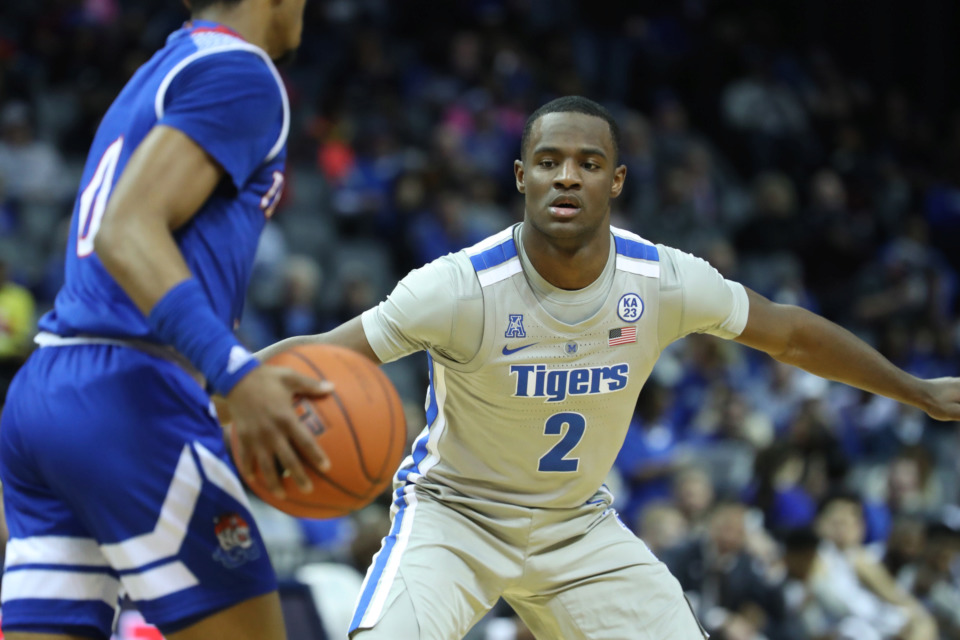 <strong>Tigers freshman point guard Alex Lomax (2) guards Tennessee State's Armani Chaney (0) on Dec. 22, 2018, at FedExForum.</strong>&nbsp;<strong>Lomax, an East High graduate, decommitted from Wichita State to play for Penny Hardaway at Memphis.</strong> (Karen Pulfer Focht/Special to The Daily Memphian)