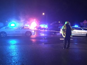 <strong>Memphis Police direct traffic around a fatal officer-involved shooting in Whitehaven Wednesday night.</strong> (Yolanda Jones/Daily Memphian)