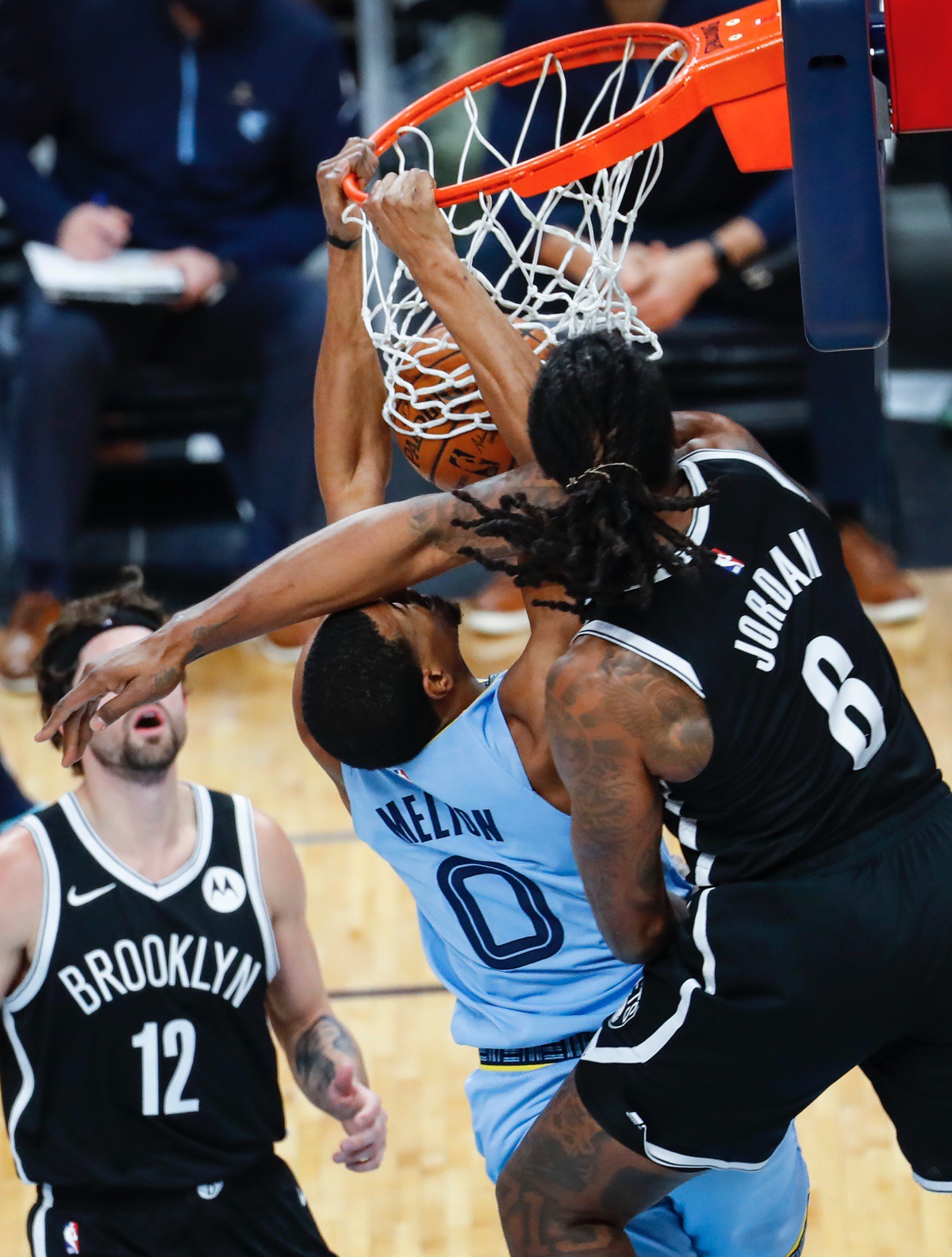 <strong>Grizzlies guard De'Anthony Melton (left) dunks over Brooklyn&rsquo;s Jeff Green (right) on Friday, Jan. 8, 2021.</strong> (Mark Weber/The Daily Memphian)