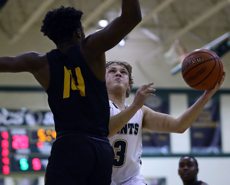 <strong>Briarcrest Christian School guard Tyler Harrington (3) tries to finish strong at the rim on Jan. 8 against Memphis Academy of Health Sciences.</strong> (Patrick Lantrip/Daily Memphian)
