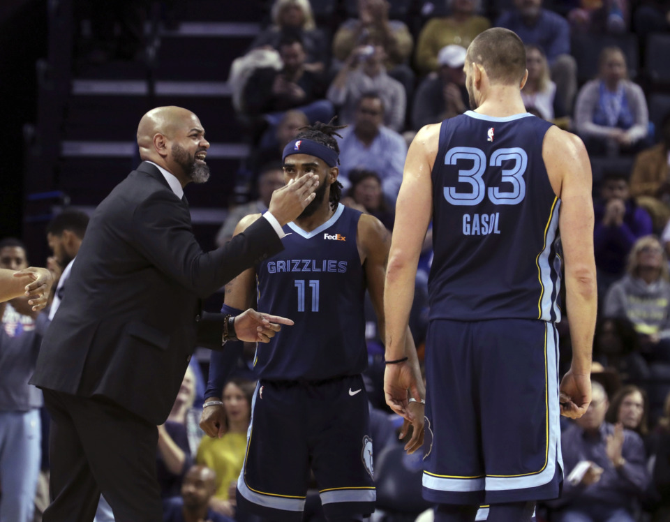 <span><strong>Memphis Grizzlies coach J. B. Bickerstaff has a word with Marc Gasol (33) and Mike Conley (11) during the first half of the team's NBA basketball game against Sacramento Kings on Friday, Nov. 16, 2018, in Memphis, Tenn.</strong> (AP Photo/Karen Pulfer Focht)</span>