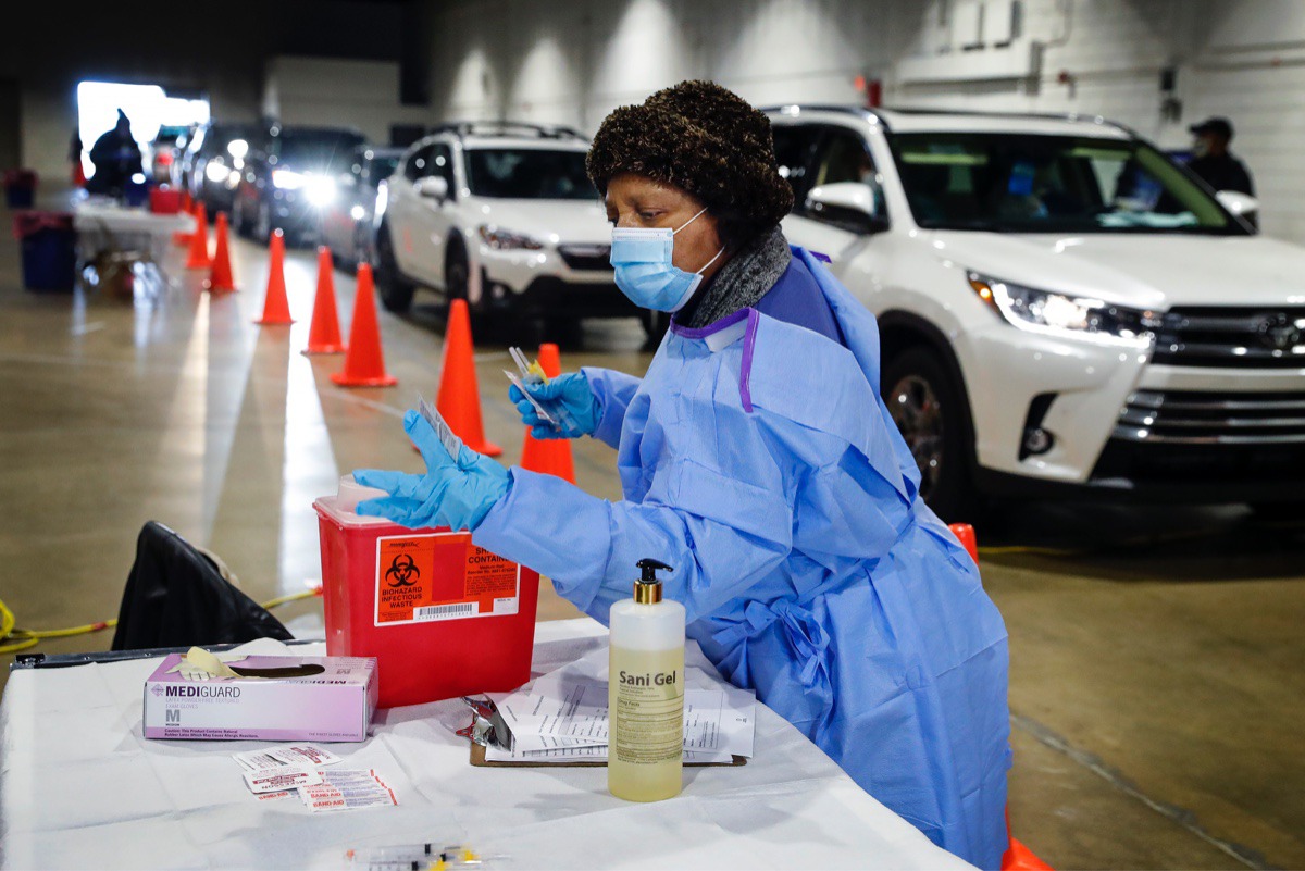 <strong>Shelby County Health Department personnel and volunteers administer COVID-19 vaccinations on Tuesday, January 12, 2021 in the Pipkin Building at Tiger Lane.</strong> (Mark Weber/The Daily Memphian)