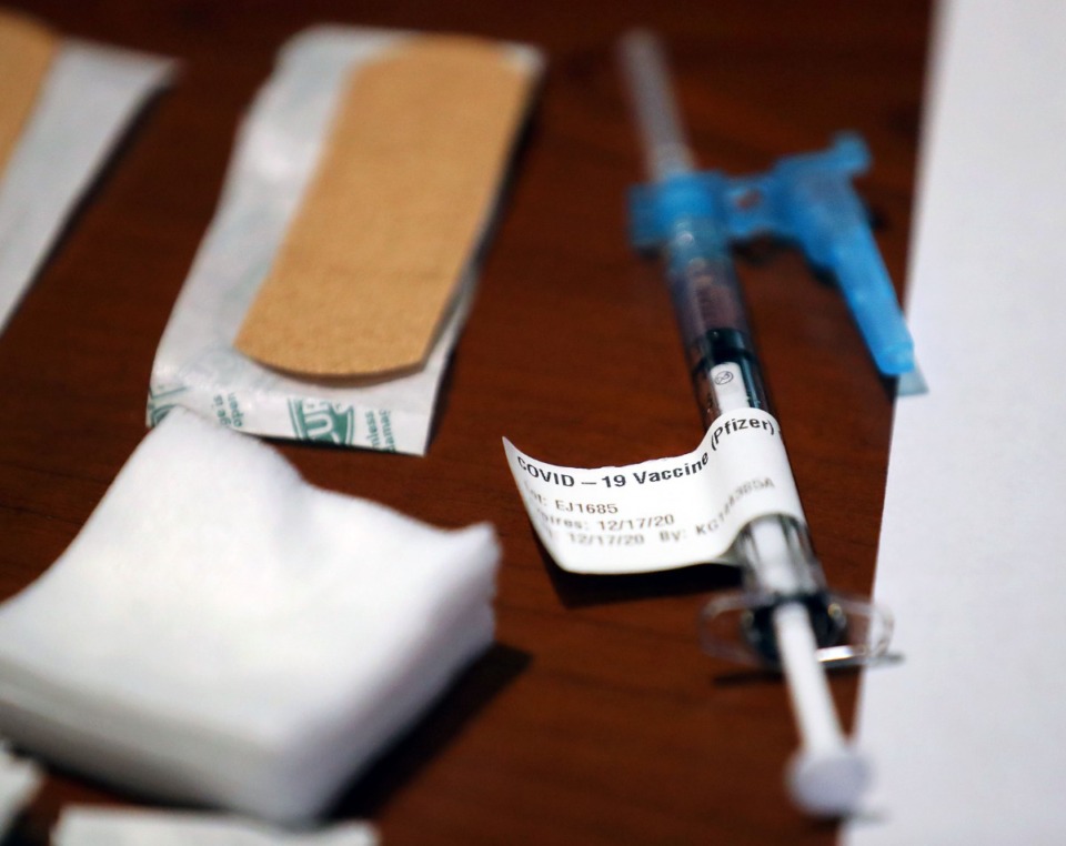 <strong>A syringe containing a dose of the COVID-19 vaccine at Methodist University Hospital. The first round of vaccines were administered in late December.</strong> (Patrick Lantrip/Daily Memphian)