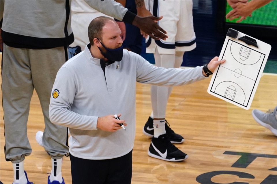<strong>Grizzlies head coach Taylor Jenkins works out a play during a timeout in the game against Minnesota, Wednesday, Jan. 13, 2021, in Minneapolis.</strong> (Jim Mone/AP)