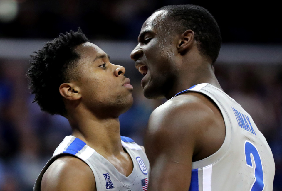 <strong>University of Memphis Tigers guard Alex Lomax (2) celebrates with guard Tyler Harris (1) after Harris scored a lay up during a game against the Wichita State Shockers on Thursday, Jan. 3, 2019. The Tigers beat the Shockers 85-74.</strong> (Houston Cofield/Daily Memphian)
