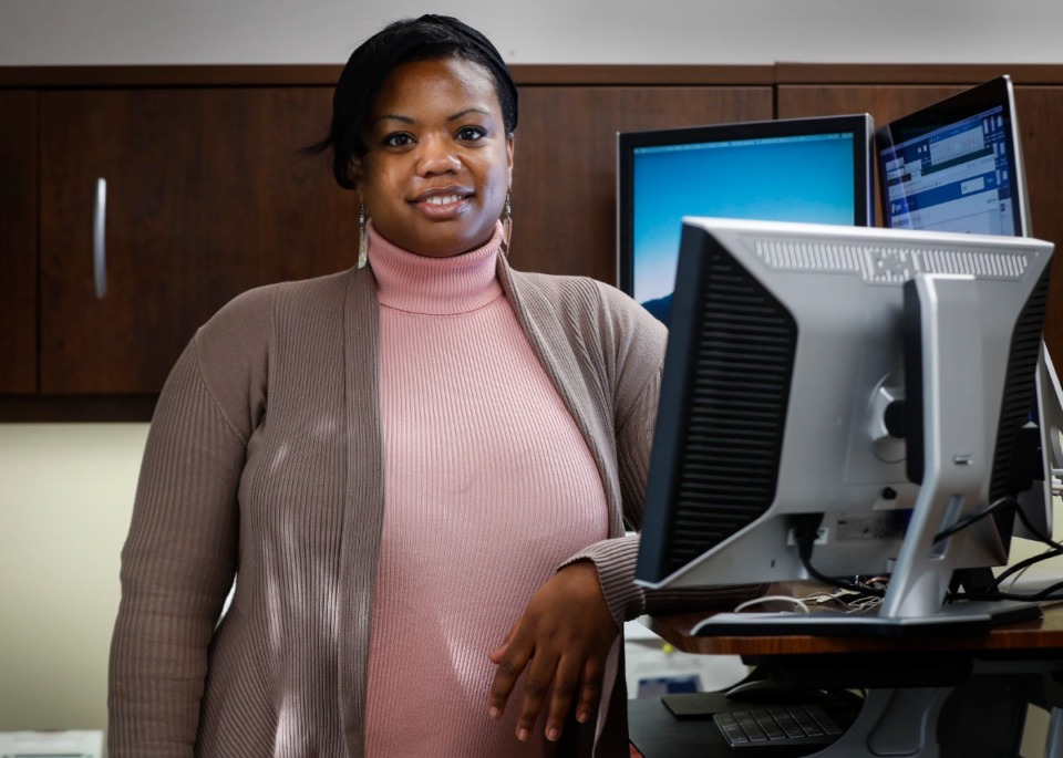 <strong>Charisse Madlock-Brown (in her office on Friday, Jan. 15), assistant professor at the University of Tennessee Health Science Center, is leading a team of national data experts digging into the medical records of 2.5 million people who were tested for COVID-19 in dozens of clinical&nbsp; centers across the nation.</strong> (Mark Weber/Daily Memphian)