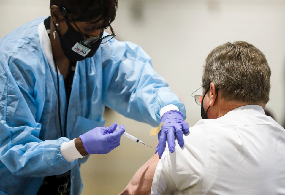 <strong>Shelby County Health Department personnel and volunteers administer COVID-19 vaccinations on Jan. 12 in the Pipkin Building at Tiger Lane.</strong> (Mark Weber/The Daily Memphian file)