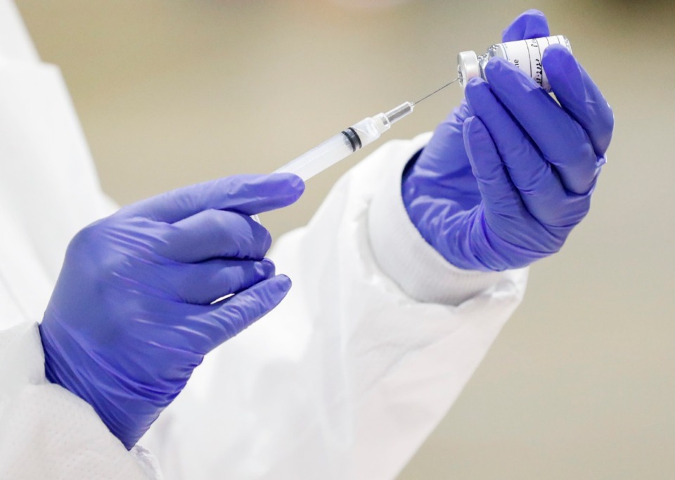<strong>Some employers are offering workers incentives such as bonus pay if they get a COVID-19 vaccination. But it means little in Tennessee where retail workers are at the bottom of the vaccination list.</strong> (Mark Weber/The Daily Memphian)