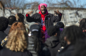 <strong>Memphis rapper AWFM directs fellow artists as they gather for a group photo ahead of the opening of The CLTV's new physical location, The CMPLX, in Orange Mound on Jan. 5, 2019, in Memphis.</strong> (Brandon Dill/Special To The Daily Memphian)