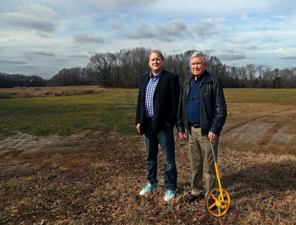 <strong>Developers Ron May (left) and Bill May stand in a field on Jan. 21, 2021, that will soon become a new residential development in Lakeland.</strong> (Patrick Lantrip/Daily Memphian)