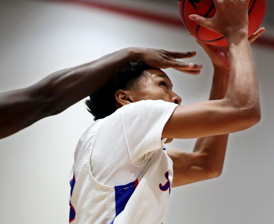 <strong>Bartlett guard J.R. Jacobs (11) is fouled while driving to the basket during the Jan. 21, 2021, game against Houston.</strong> (Patrick Lantrip/Daily Memphian)