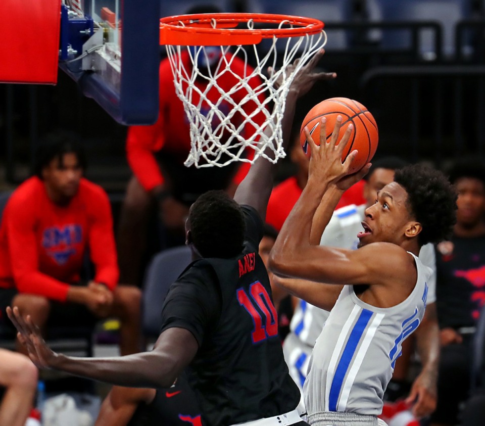<strong>University of Memphis forward DeAndre Williams (12) goes up for a layup against Southern Methodist University on Jan. 26, 2021.</strong> (Patrick Lantrip/Daily Memphian)