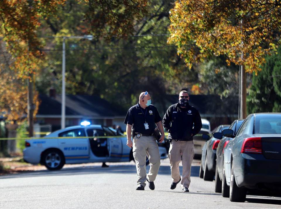 <strong>Homicide detectives walk away from a crime scene on Prescott Street on Nov. 12, 2020. Violent crime soared in Memphis and Shelby County last year according to a new report.</strong> (Patrick Lantrip/Daily Memphian file)