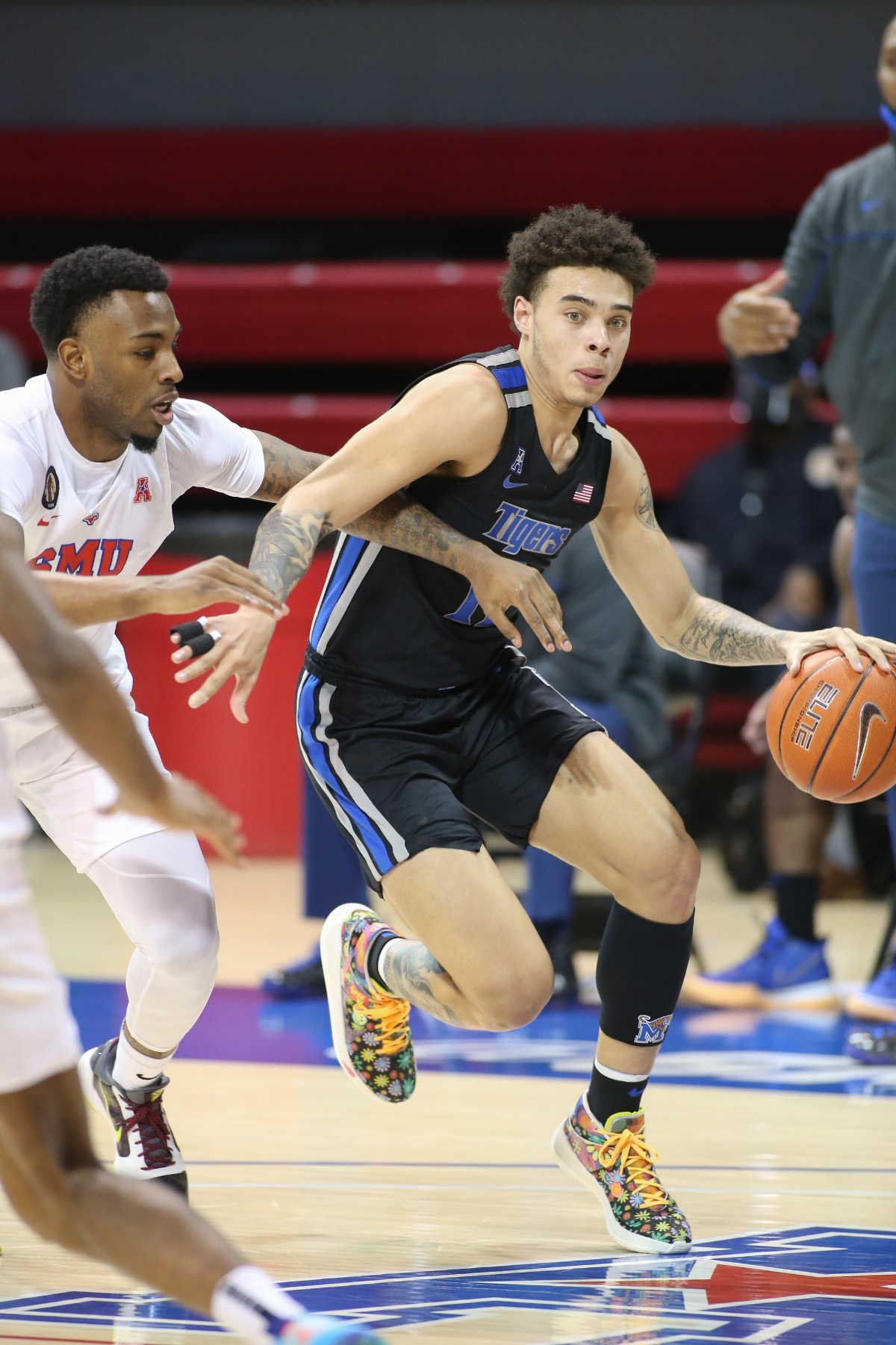 <strong>Lester Quinones works around an SMU defender in Dallas on Jan. 28, 2021.</strong> (Courtesy University of Memphis)