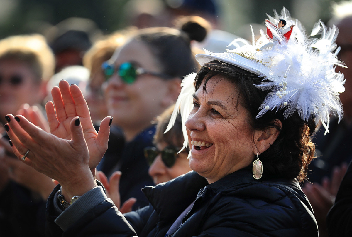 <strong>Michelle Mann from San Francisco, Calif., comes festooned with her Elvis hat as Elvis fans gather at Graceland on Jan. 8, 2019, to celebrate the King of Rock &rsquo;n&rsquo; Roll&rsquo;s 84th birthday during the annual birthday proclamation and cake cutting ceremony on the front lawn.&nbsp;&nbsp;</strong>(Jim Weber/Daily Memphian)