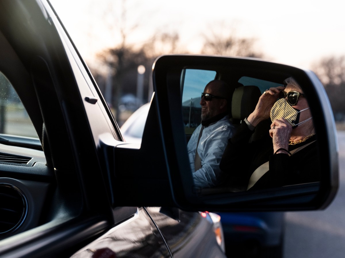 <strong>&ldquo;They have mishandled this whole process,&rdquo; Judith Rogers (right) said while waiting for more than three hours in line Friday, Jan. 29, 2021 at the Pipkin Building. Her son-in-law Kevin Petite is at left.</strong> (Brad Vest/Special to The Daily Memphian)