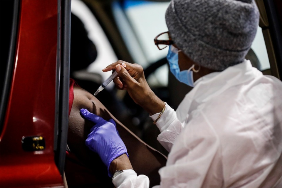 <strong>Shelby County Health Department personnel and volunteers administer COVID-19 vaccinations on Tuesday, Jan. 12, 2021 in the Pipkin Building at Tiger Lane.</strong> (Mark Weber/Daily Memphian file)