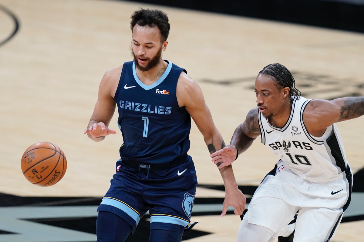 <strong>Memphis Grizzlies forward Kyle Anderson (1) drives around San Antonio Spurs forward DeMar DeRozan (10) in San Antonio, Monday, Feb. 1, 2021.</strong> (Eric Gay/AP)