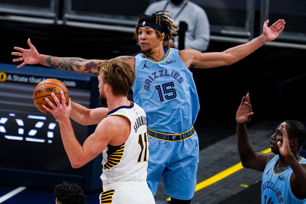<strong>Memphis Grizzlies forward Brandon Clarke (15) defends against Indiana Pacers forward Domantas Sabonis (11) on Tuesday in Indianapolis.</strong> (Michael Conroy/AP)