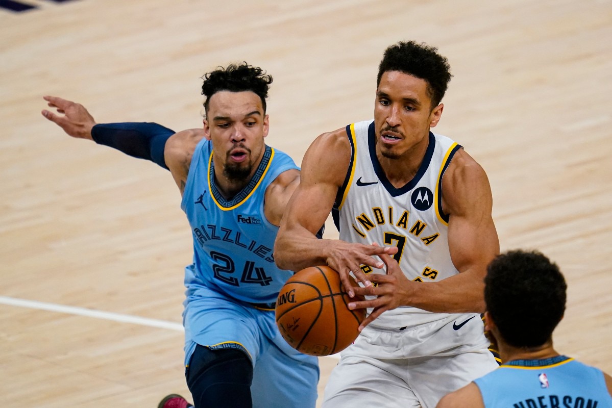 <strong>Memphis Grizzlies guard Dillon Brooks (24) knocks the ball away from Indiana Pacers guard Malcolm Brogdon (7)&nbsp; in Indianapolis on Tuesday, Feb. 2, 2021.</strong> (Michael Conroy/AP)