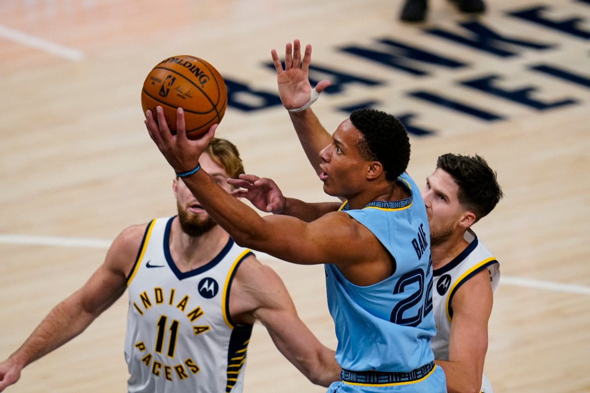 <strong>Memphis Grizzlies guard Desmond Bane (22) shoots in front of Indiana Pacers forward Domantas Sabonis (11) and guard T.J. McConnell in Indianapolis, Tuesday, Feb. 2, 2021.</strong> (Michael Conroy/AP)
