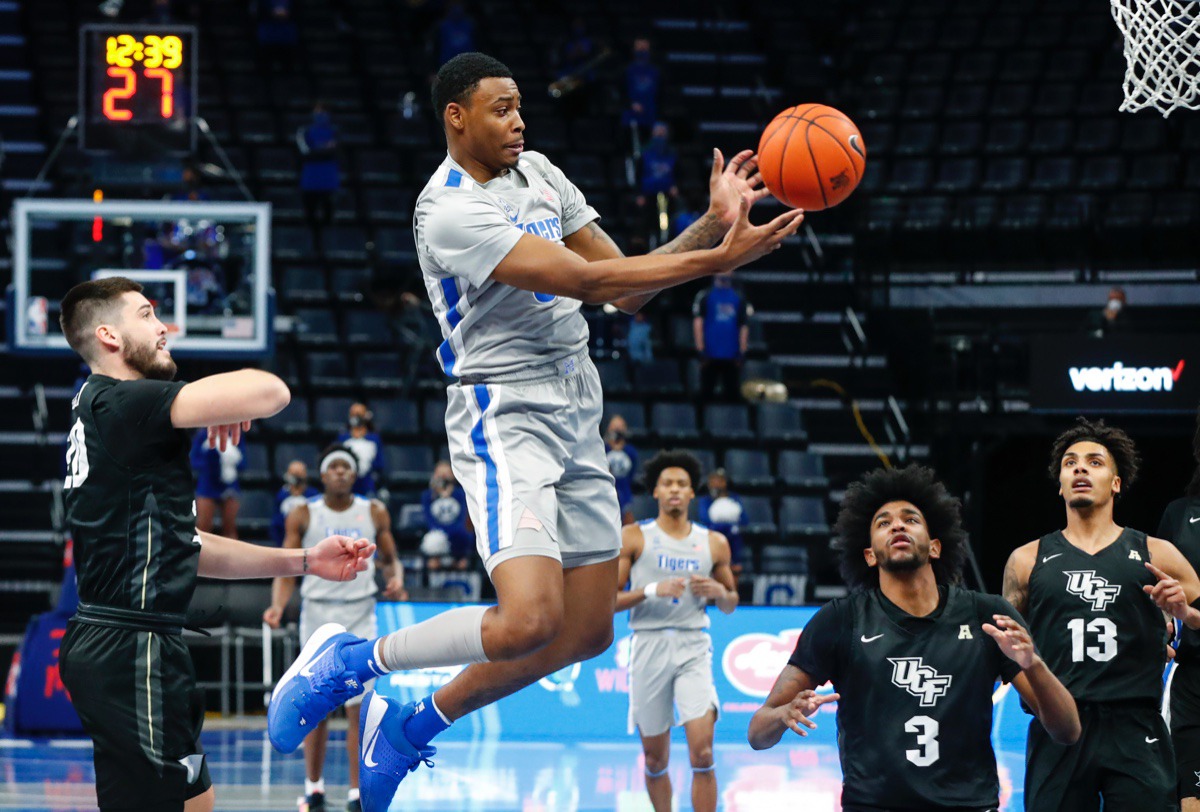 <strong>Tigers forward D.J. Jeffries (middle) can&rsquo;t hang onto a pass during the game against UCF on Wednesday, Feb. 3, 2021.</strong> (Mark Weber/The Daily Memphian)