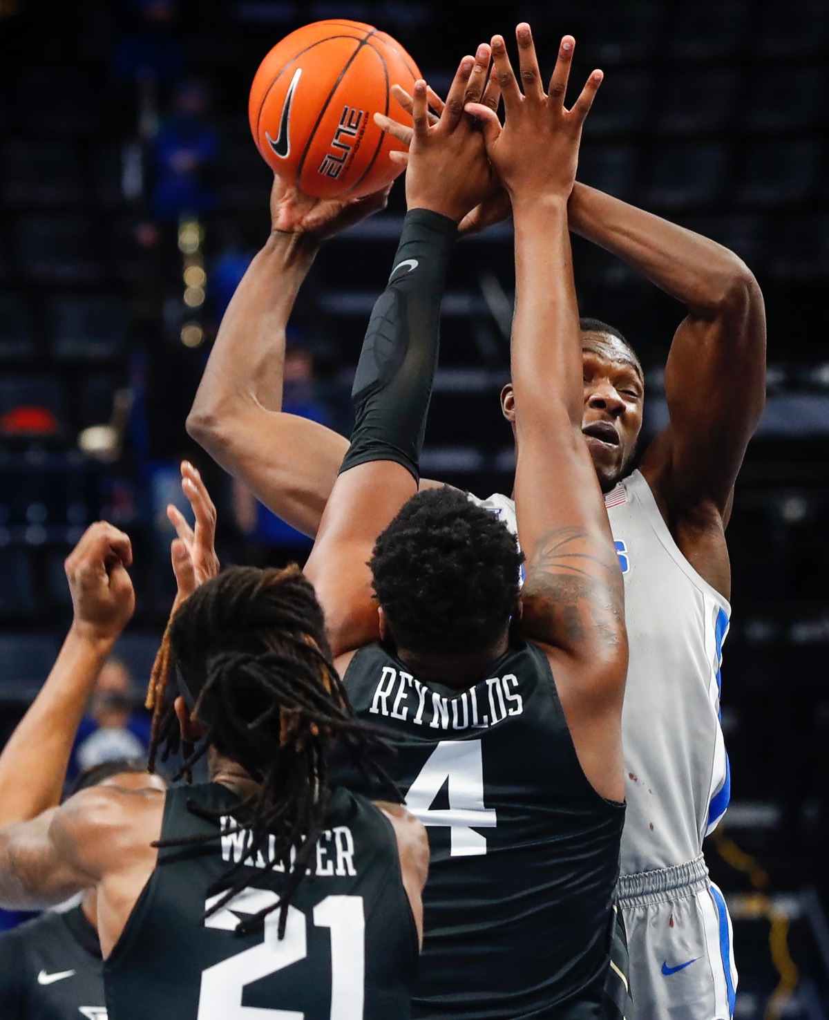 <strong>Tigers center. Moussa Cisse (right) drives the lane against UCF on Wednesday, Feb. 3, 2021.</strong> (Mark Weber/The Daily Memphian)