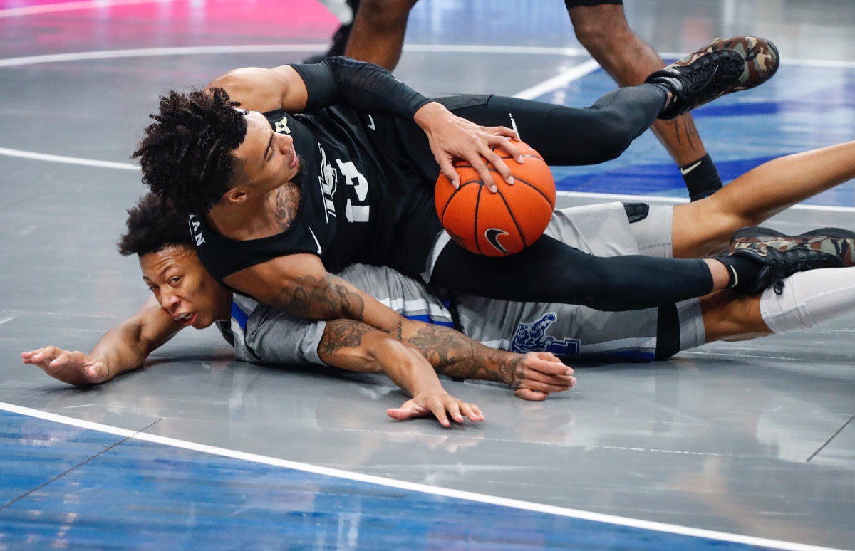 <strong>Tigers guard Boogie Ellis (bottom) loses the ball to UCF&rsquo;s Brandon Mahan (top) on Wednesday, Feb. 3, 2021.</strong> (Mark Weber/The Daily Memphian)