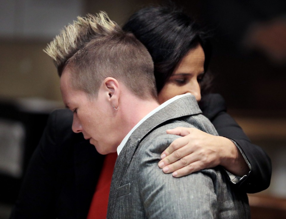 <strong>April Alley (front), daughter of Sedley Alley, is hugged by a member of her legal team in a Memphis courtroom Oct. 14, 2019. Alley hopes to learn whether DNA evidence would prove her father was innocent of a crime for which he was executed.</strong> (Patrick Lantrip/Daily Memphian file)
