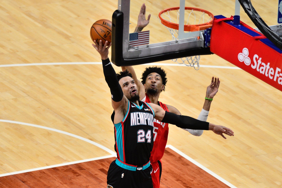 <strong>Memphis Grizzlies guard Dillon Brooks (24) shoots against Houston Rockets center Christian Wood on Feb. 4.</strong> (Brandon Dill/AP)