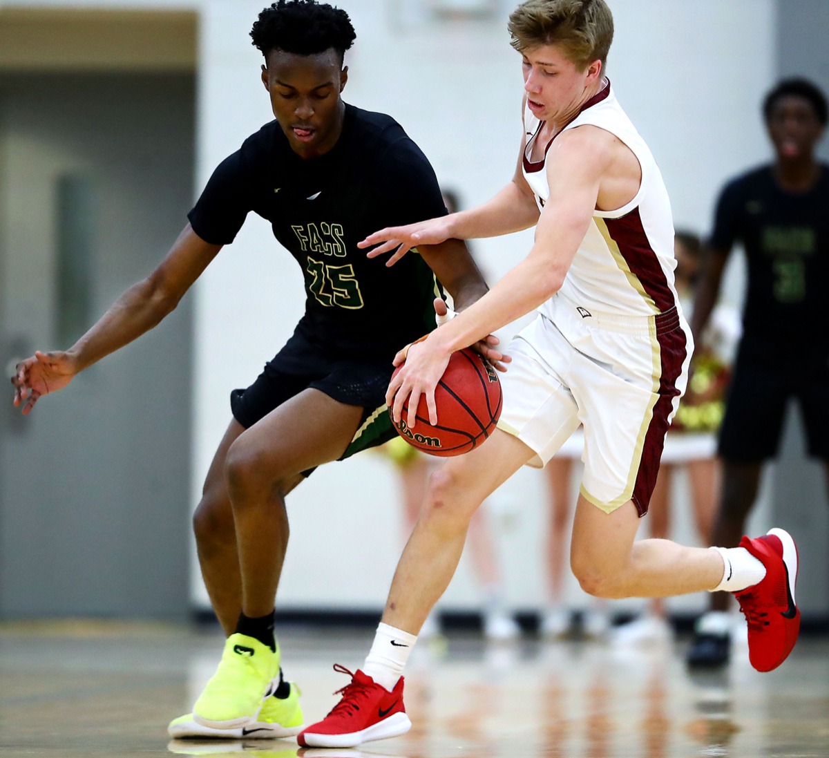 <strong>FACS forward Daniel Egbuniwe (25) tries to steal the ball from ECS guard Mason Shropshire (5).</strong> (Patrick Lantrip/Daily Memphian)