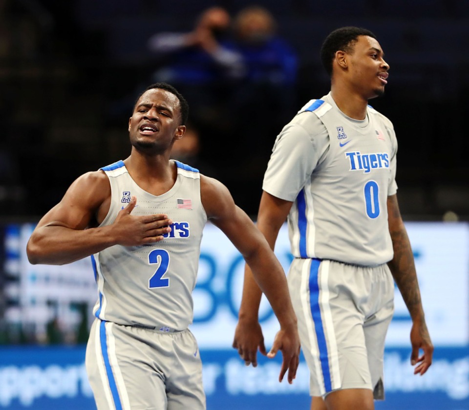 <strong>Memphis Tigers guard Alex Lomax (2), with forward D.J. Jeffries (0), tries to hype up the crowd during a Feb. 6, 2021 game against ECU at the FedExForum.</strong> (Patrick Lantrip/Daily Memphian)