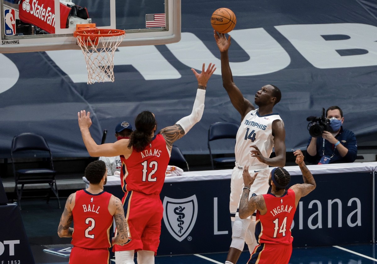 <strong>Memphis Grizzlies center Gorgui Dieng (14) shoots over New Orleans Pelicans center Steven Adams (12) in the first quarter of an NBA basketball game in New Orleans, Saturday, Feb. 6, 2021.</strong> (Derick Hingle/AP)